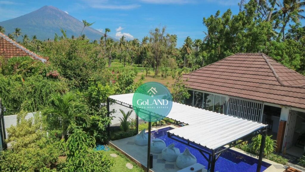 pool and Mt Agung view from this villa for sale in Amed